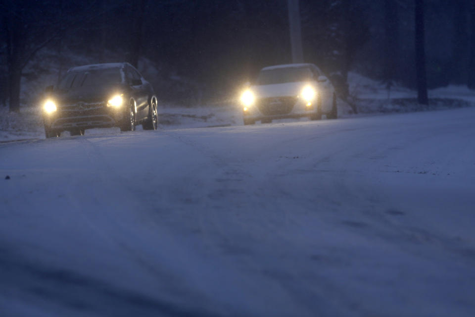 Motorists make their way along an icy road Sunday Jan. 31, 2021 in Philadelphia. After days of frigid temperatures, the Northeast is bracing for a whopper of a storm that could dump well over a foot of snow in many areas and create blizzard-like conditions. (AP Photo/Jacqueline Larma)