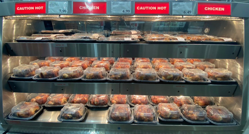 Costco hot roast chicken display.