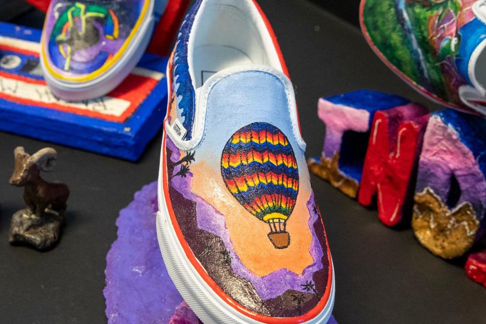 Indio High School students designed and painted blank Vans for the Vans High School Custom Culture competition with the theme of Hometown Pride, Indio, Calif., on Wednesday, April 27, 2022.