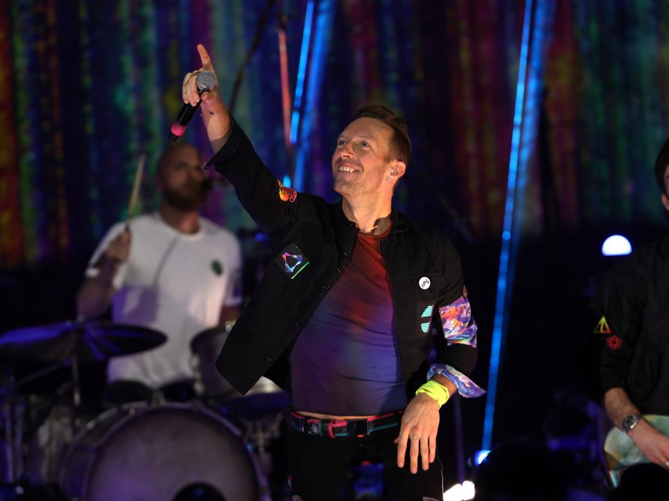 chris martin performing on stage