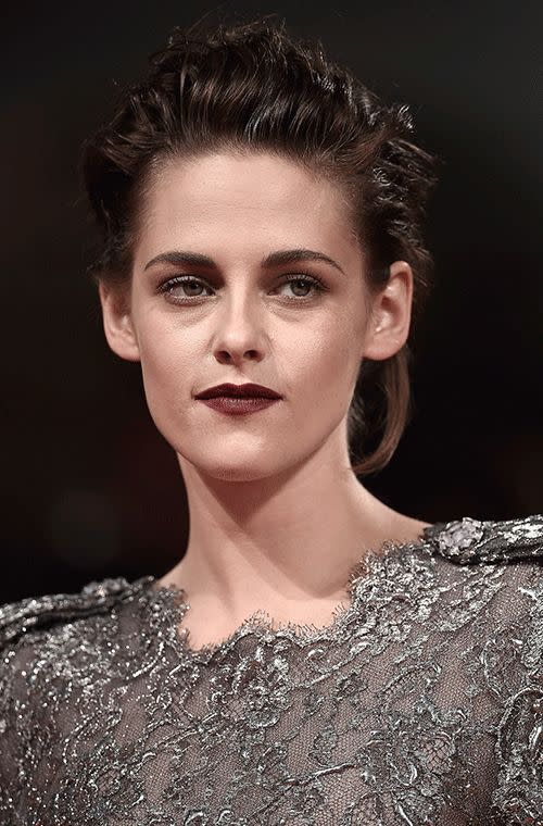 Stewart went for a vampy look at the premiere of <i>Equals</i> during the 72nd Venice Film Festival. Her bronzed porcelain skin goes fab with that burgundy lippy, maroon eye shadow and rock ’n’ roll up ‘do. A totally different ball game for Stewart going for a delicate lace gunmetal dress, very Avant-guard!