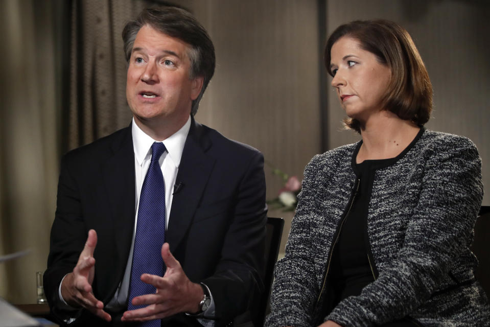 Brett Kavanaugh, with his wife, Ashley Estes Kavanaugh, answers questions during a Fox News interview about allegations of sexual misconduct. (Photo: Jacquelyn Martin/AP)