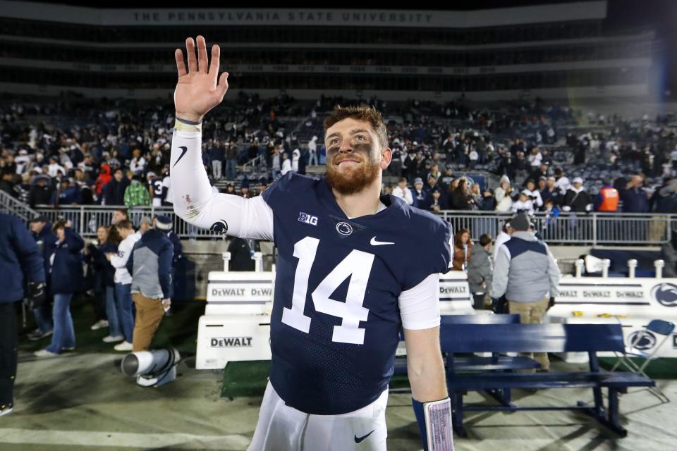 Nov 26, 2022; University Park, Pennsylvania, USA; Penn State Nittany Lions quarterback Sean Clifford (14) waves to the fans following the game against the Michigan State Spartans at Beaver Stadium. Penn State defeated Michigan State 35-16. Mandatory Credit: Matthew OHaren-USA TODAY Sports