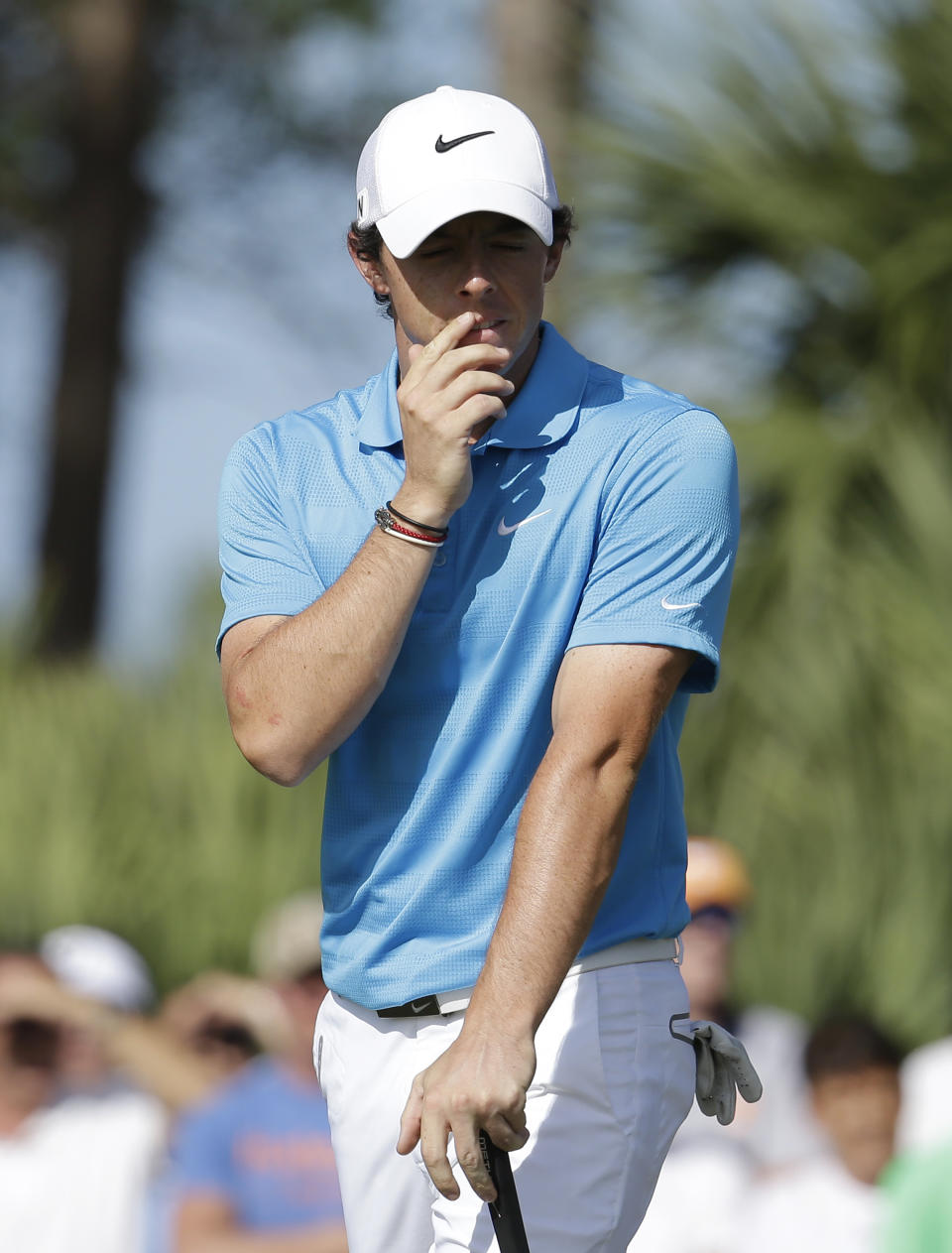 Rory McIlroy, of Northern Ireland, watches after hitting on the eighth hole during the final round of the Honda Classic golf tournament on Sunday, March 2, 2014, in Palm Beach Gardens, Fla. (AP Photo/Lynne Sladky)