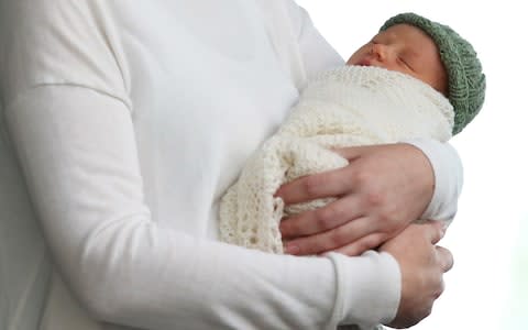 Baby Neve sleeps through all the fuss - Credit:  Fiona Goodall/Getty Images