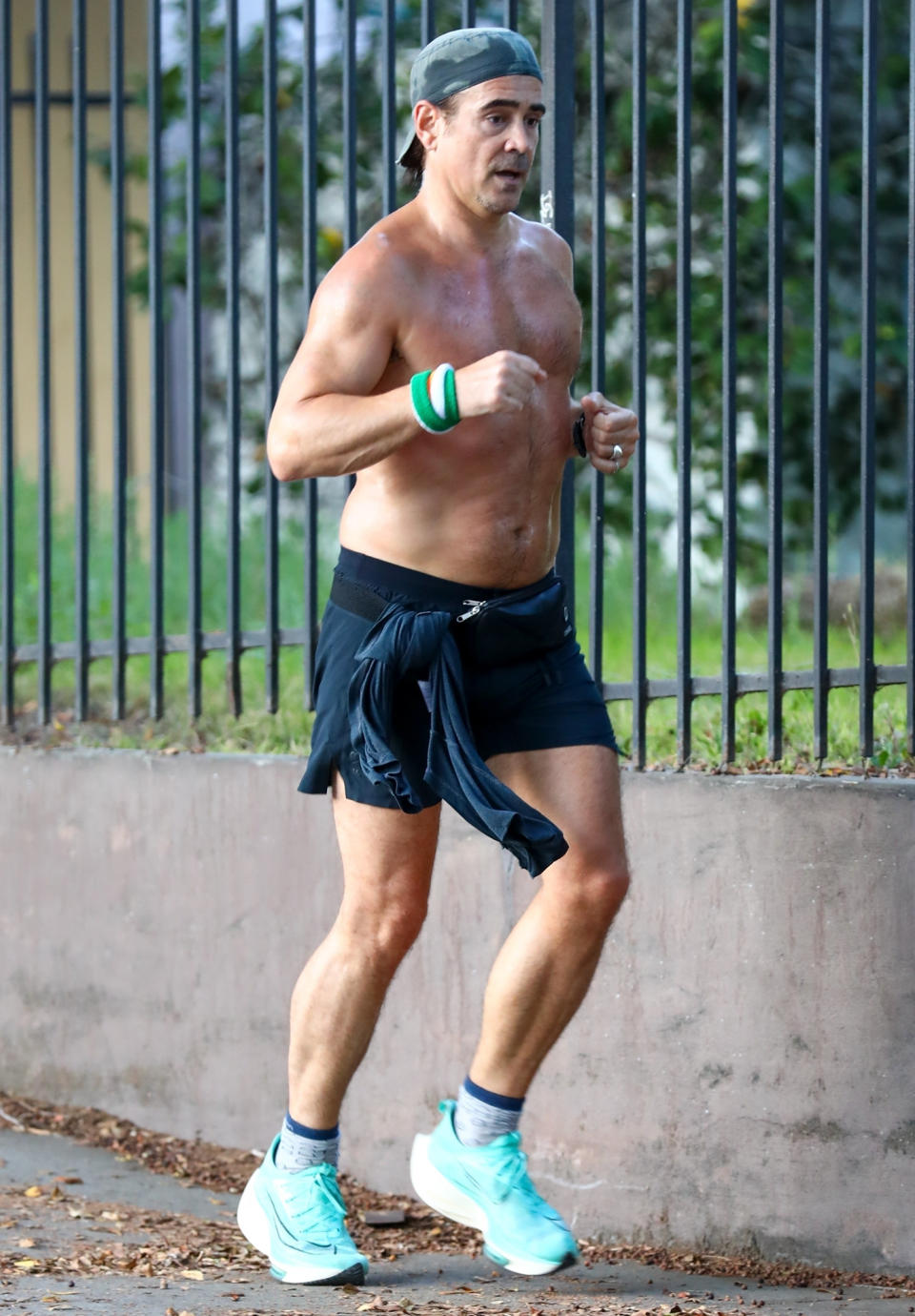 <p>Colin Farrell breaks a sweat while running in Los Angeles on July 5. </p>