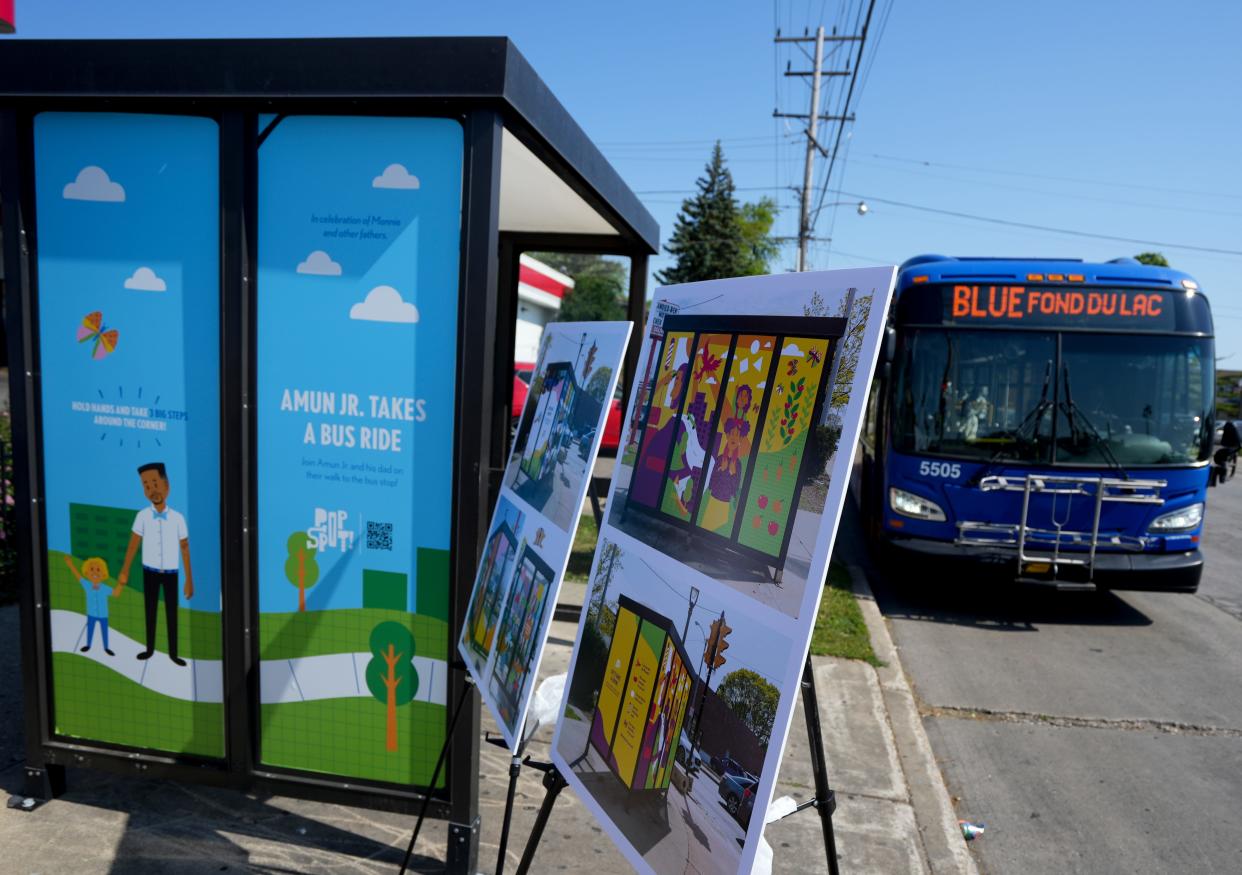 A Milwaukee County Transit System bus passes a bus shelter near 6410 W. Silver Spring Drive on Tuesday, June 28, 2022. The shelter has recently been adorned with a colorful mural. This mural is part of the City of Milwaukee Office of Early Childhood Initiatives "Pop Spots" mural series meant to promote early literacy and parental involvement with young children.