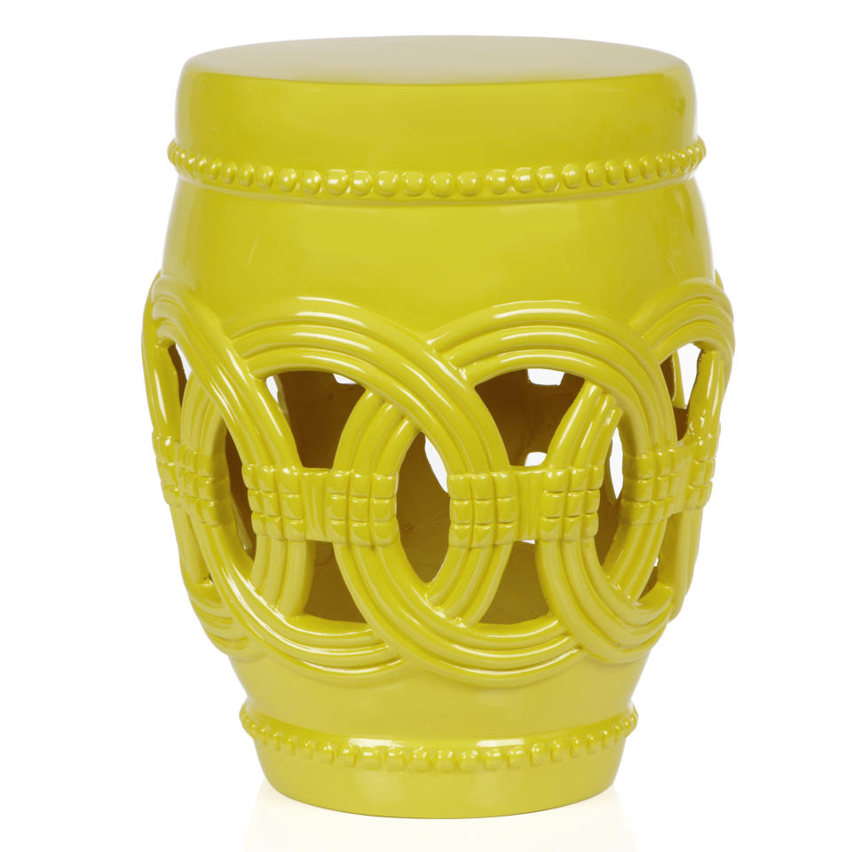 This undated publicity photo provided by Z Gallerie shows a Palmer stool. Bright neon yellow accessories add a punch of color to spring decor. Offset the intensity with crisp white or darker hues that will simultaneously tone them down while showing them off (www.zgallerie.com). AP Photo/Z Gallerie, TSK Photography)