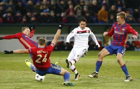 Football Soccer - PFC CSKA Moscow v Bayer Leverkusen - UEFA Champions League Group Stage - Group E - CSKA Stadium, Moscow, Russia - 22/11/16. CSKA Moscow's Vasili Berezutski, Aleksei Berezutski (L, back) and Pontus Wernbloom (R) in action against Bayer Leverkusen's Javier Hernandez. REUTERS/Sergei Karpukhin