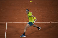 Spain's Rafael Nadal plays a shot against Germany's Alexander Zverev during their semifinal match at the French Open tennis tournament in Roland Garros stadium in Paris, France, Friday, June 3, 2022. (AP Photo/Christophe Ena)