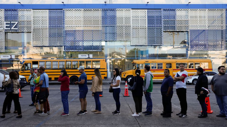 Voters line up at a polling station during general elections in San Salvador, El Salvador, on Sunday. - Moises Castillo/AP