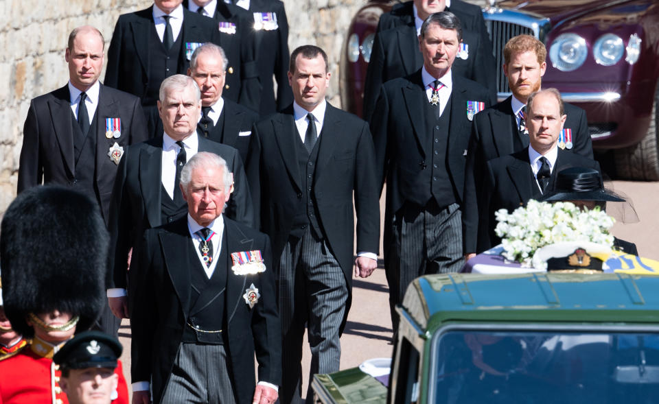 WINDSOR, ENGLAND - APRIL 17: Prince Charles, Prince of Wales, Prince Andrew, Duke of York, Prince Edward, Earl of Wessex, Prince William, Duke of Cambridge, Peter Phillips, Prince Harry, Duke of Sussex, Earl of Snowdon David Armstrong-Jones and Vice-Admiral Sir Timothy Laurence follow Prince Philip, Duke of Edinburgh's coffin during the Ceremonial Procession during the funeral of Prince Philip, Duke of Edinburgh on April 17, 2021 in Windsor, England. Prince Philip of Greece and Denmark was born 10 June 1921, in Greece. He served in the British Royal Navy and fought in WWII. He married the then Princess Elizabeth on 20 November 1947 and was created Duke of Edinburgh, Earl of Merioneth, and Baron Greenwich by King VI. He served as Prince Consort to Queen Elizabeth II until his death on April 9 2021, months short of his 100th birthday. His funeral takes place today at Windsor Castle with only 30 guests invited due to Coronavirus pandemic restrictions. (Photo by Pool/Samir Hussein/WireImage)