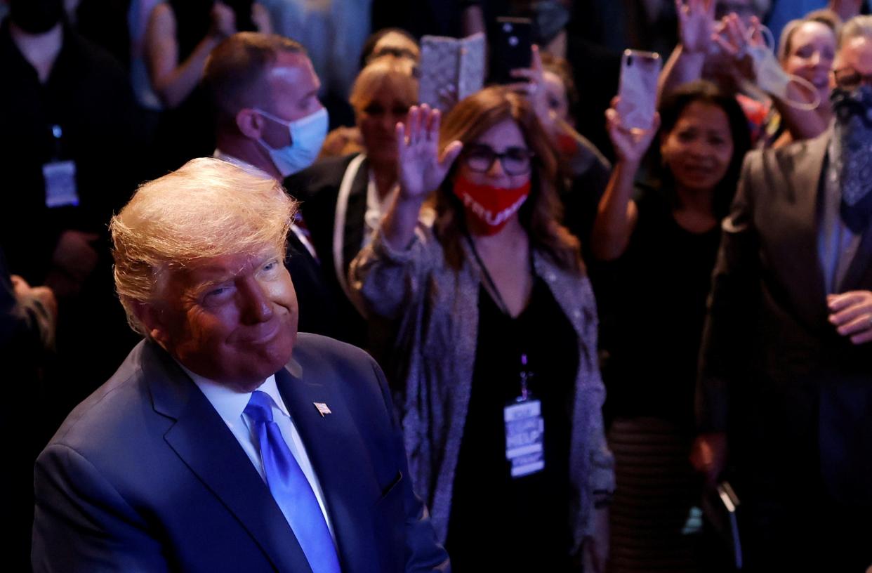 Donald Trump attends a mass at the International Church of Las Vegas on 18 October. (REUTERS)