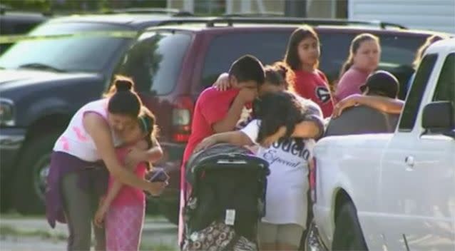 Neighbours say they had no idea this would happen and that the children seemed happy with their lives. Photo: AP