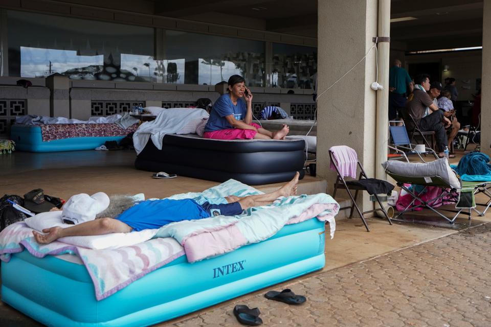 Local residents who were displaced by the wildfires at the War Memorial Stadium in Kahului, Hawaii on August 10, 2023.