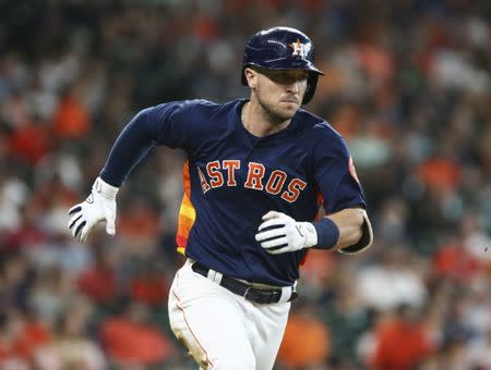 Jul 15, 2018; Houston, TX, USA; Houston Astros third baseman Alex Bregman (2) hits a double during the ninth inning against the Detroit Tigers at Minute Maid Park. Mandatory Credit: Troy Taormina-USA TODAY Sports