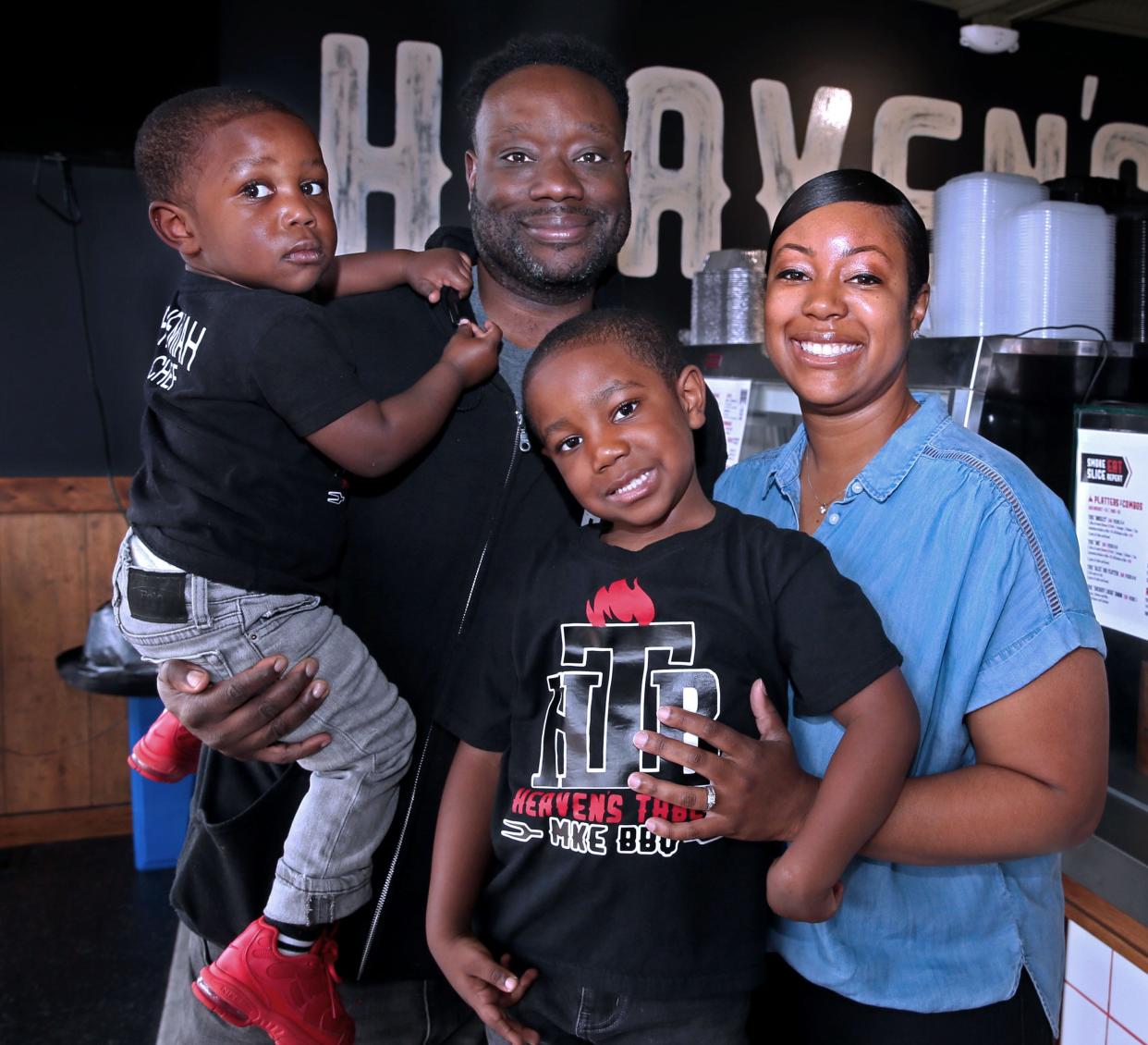 Heaven’s Table BBQ is closed on Sundays, but chef-owner Jason Alston still will be cooking on Father's Day. He'll cook for his family: sons Nehemiah, 2, whom he's holding, and Noah, 4, and his wife, Karesha.