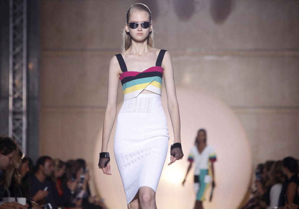 A model wears a creation for French fashion designer Roland Mouret's ready-to-wear Spring/Summer 2014 fashion collection, presented in Paris, Friday, Sept.27, 2013. (AP Photo/Thibault Camus)