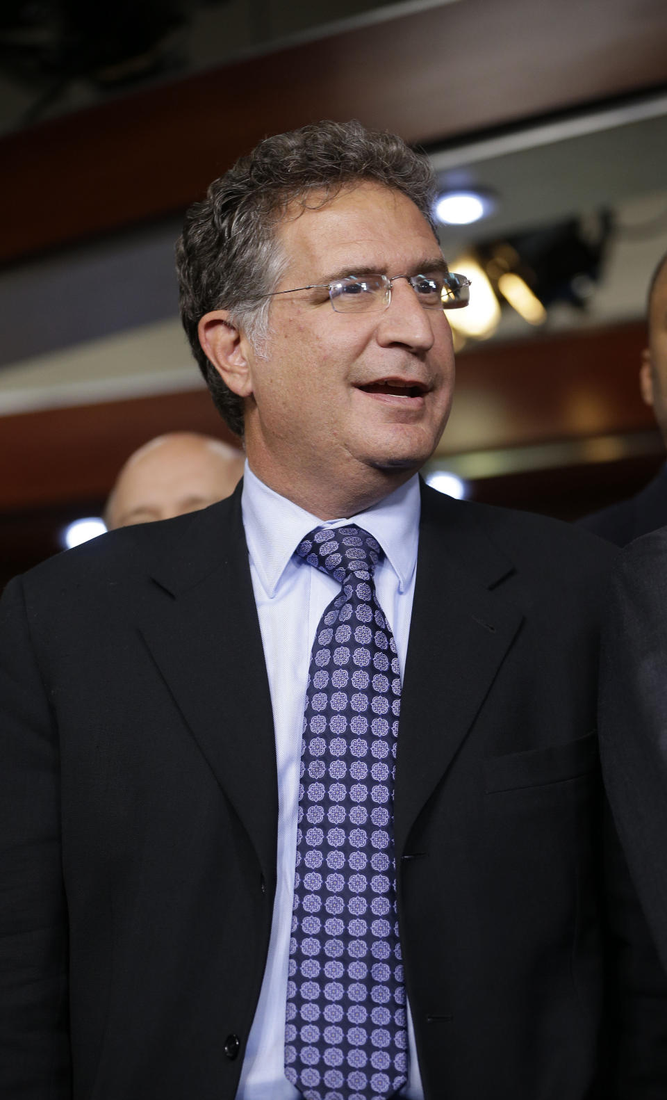 Rep.-elect Joe Garcia, D-Fla. is seen on stage during a news conference with newly elected Democratic House members, on Capitol Hill in Washington, Tuesday, Nov. 13, 2012. (AP Photo/Pablo Martinez Monsivais) 
