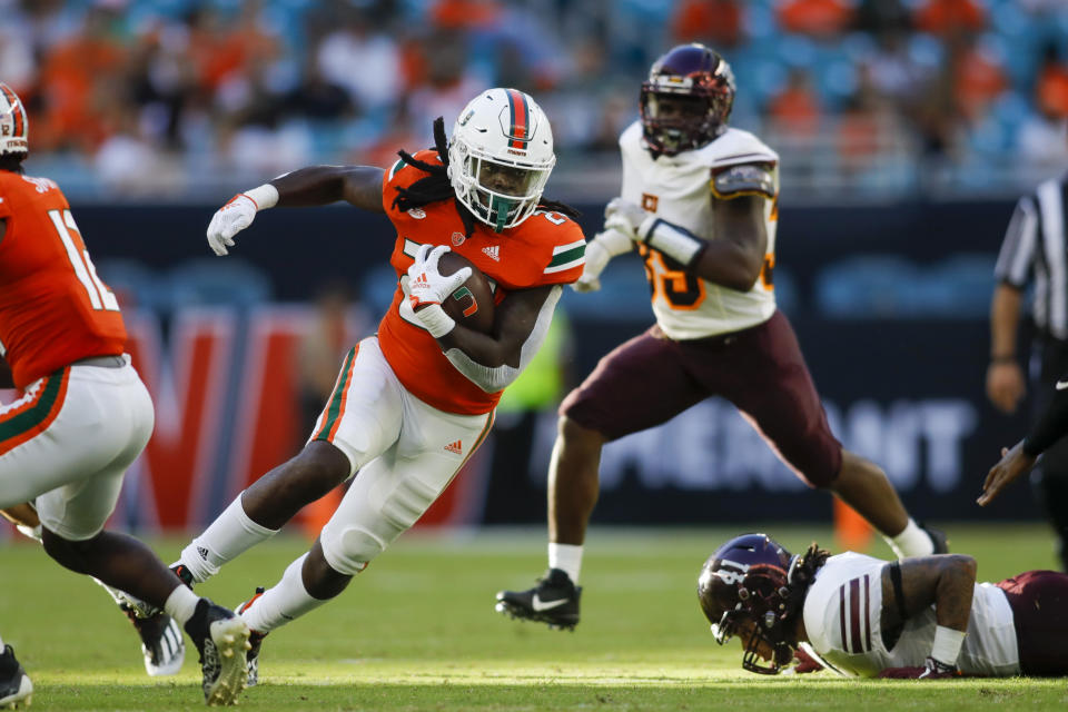Sep 3, 2022; Miami Gardens, Florida, USA; Miami Hurricanes safety Kamren Kinchens (24) runs with the football during the fourth quarter against the Bethune Cookman Wildcats at Hard Rock Stadium. Mandatory Credit: Sam Navarro-USA TODAY Sports