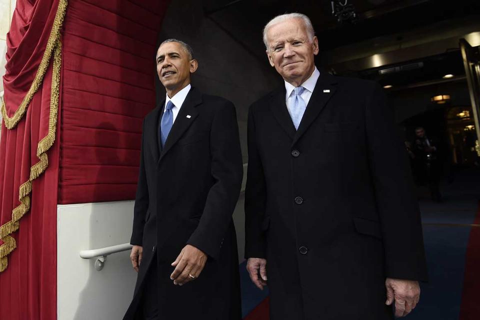 FILE - In this Jan. 20, 2017, file photo, President Barack Obama and Vice President Joe Biden arrive for the Presidential Inauguration of Donald Trump at the U.S. Capitol in Washington. 2020 presidential candidate and former Vice President Biden is releasing a video of his first in-person meeting with former President Obama since the coronavirus outbreak began, enlisting the former president to help slam his successor's response to the pandemic. (Saul Loeb/Pool Photo via AP, File)