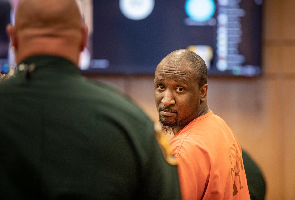 Marcelle Jerrill Waldon looks back toward the courtroom during his status hearing before Judge J. Kevin Abdoney in Bartow on Friday. Waldon is charged with killing former Lakeland commissioner Edie Yates Henderson and her husband David Henderson on Nov. 10, 2020 at their Lake Morton home. The prosecution is seeking the death penalty, and the trial is set for Jan. 15.