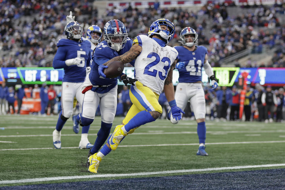 Los Angeles Rams running back Kyren Williams (23) runs in a touchdown during the second half an NFL football game against the New York Giants, Sunday, Dec. 31, 2023, in East Rutherford, N.J. (AP Photo/Adam Hunger)