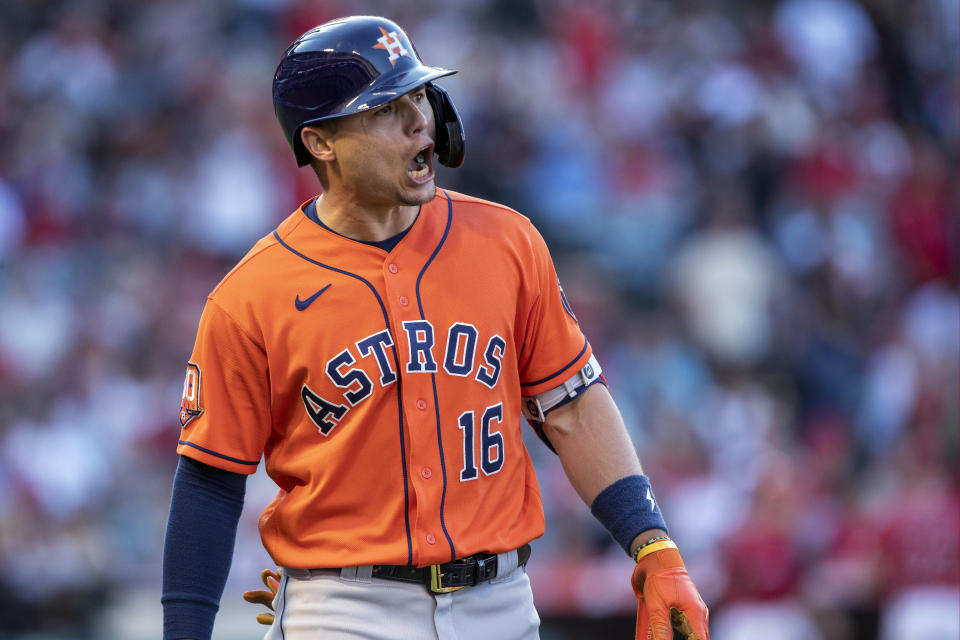 Houston Astros' Aledmys Diaz gets yells at first base umpire for calling him out on a swinging third strike during the sixth inning of the team's baseball game against the Los Angeles Angels in Anaheim, Calif., Thursday, July 14, 2022. (AP Photo/Alex Gallardo)