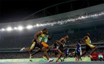 Bolt already had his hand in a 'number 1' gesture as he crossed the finish line in the sold-out Olympic stadium. Photo: Getty