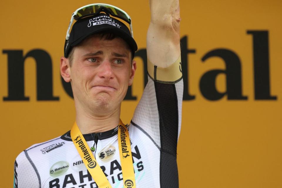 Bahrain  Victorious Slovenian rider Matej Mohoric celebrates his victory on the podium after winning the 19th stage of the 110th edition of the Tour de France cycling race 173 km between MoiransenMontagne and Poligny in the Jura department of centraleastern France on July 21 2023 Photo by Thomas SAMSON  AFP Photo by THOMAS SAMSONAFP via Getty Images