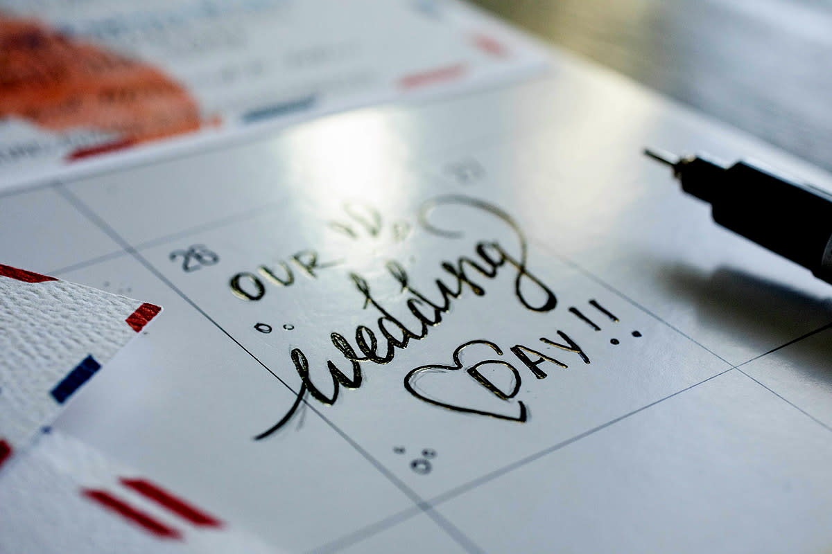 A wedding day is marked on a calendar.