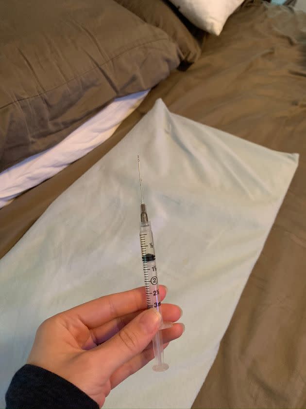 a needle the author had to use for progesterone shots in a recent round of IVF. (Photo: Photo Courtesy Of Kelli Thompson)