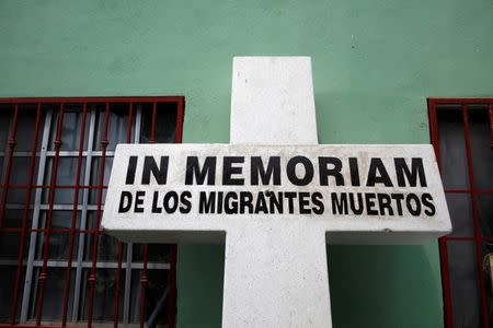 FILE PHOTO: A memorial cross for people who have died crossing the border is seen at Casa del Migrante in Reynosa, Mexico April 1, 2013. REUTERS/Eric Thayer/File Photo