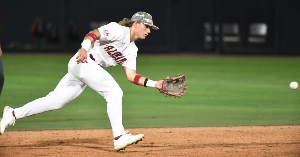 Alabama infielder Jim Jarvis (10) makes the play on a ball against Nicholls at Sewell-Thomas Stadium in Tuscaloosa, Ala., Friday June 2, 2023, in the first round of the NCAA Regional Baseball Tournament. 