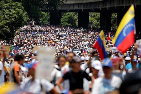 Demonstrators attend a women's march to protest against President Nicolas Maduro's government in Caracas, Venezuela, May 6, 2017. REUTERS/Carlos Garcia Rawlins