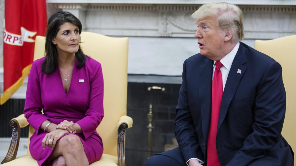 PHOTO: President Donald Trump, right, speaks with Nikki Haley, Ambassador to the United Nations, during a meeting in the Oval Office, Oct. 9, 2018.  (Zach Gibson/Bloomberg via Getty Images)