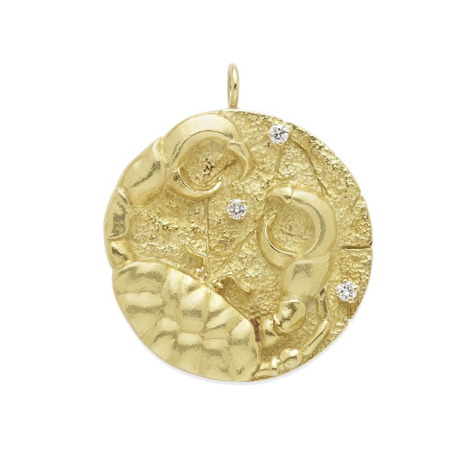 This gold Cancer Zodiac Medallion from Tiffany & Co. (circa 1970) is estimated to fetch between $5,000 and $7,000.