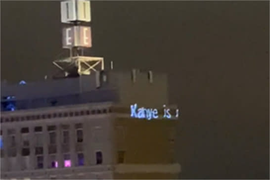 An antisemitic message referencing Kanye West was projected on a building in Jacksonville, Fla. (Obtained by NBC News)