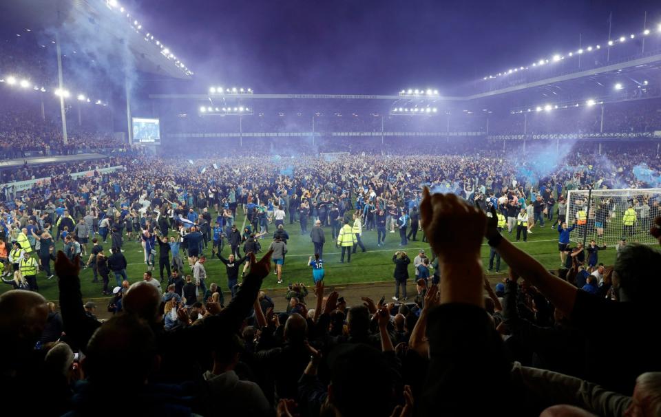 Everton fans celebrate a momentous win - REUTERS