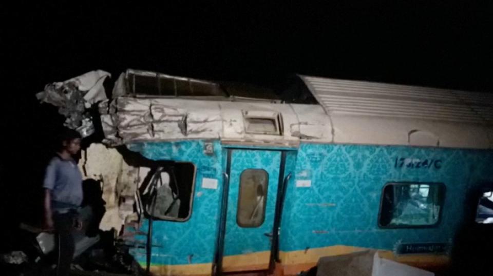 The Howrah Superfast Express derailed and became entangled with the Coromandel Express on Friday (ANI/Reuters)