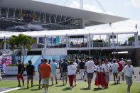 Racing fans arrive for the Formula One Miami Grand Prix auto race at Miami International Autodrome, Sunday, May 8, 2022, in Miami Gardens, Fla. (AP Photo/Wilfredo Lee)