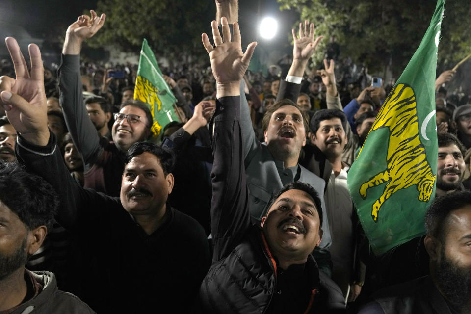 Supporters of Former Prime Minister Nawaz Sharif' party 'Pakistan Muslim League-N' celebrate their party victory in the initial results of the country's parliamentary election, in Lahore, Pakistan, Friday, Feb. 9, 2024. (AP Photo/K.M. Chaudary)