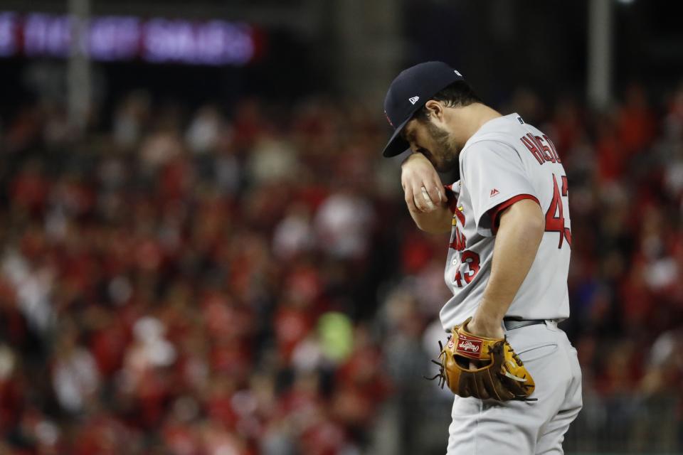 St. Louis Cardinals starting pitcher Dakota Hudson reacts during the first inning of Game 4 of the baseball National League Championship Series against the St. Louis Cardinals Tuesday, Oct. 15, 2019, in Washington. (AP Photo/Jeff Roberson)