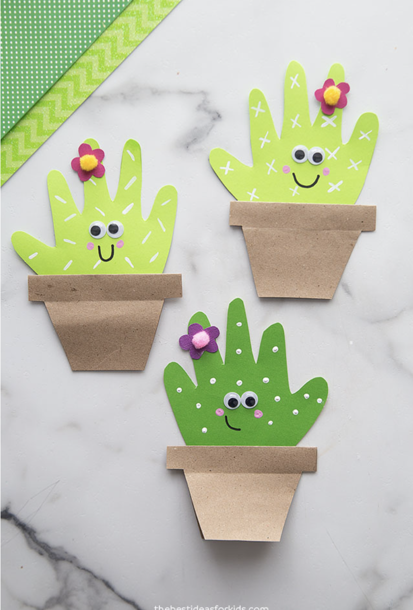 crafts for kids, paper cacti with googly eyes and drawn on smiley faces