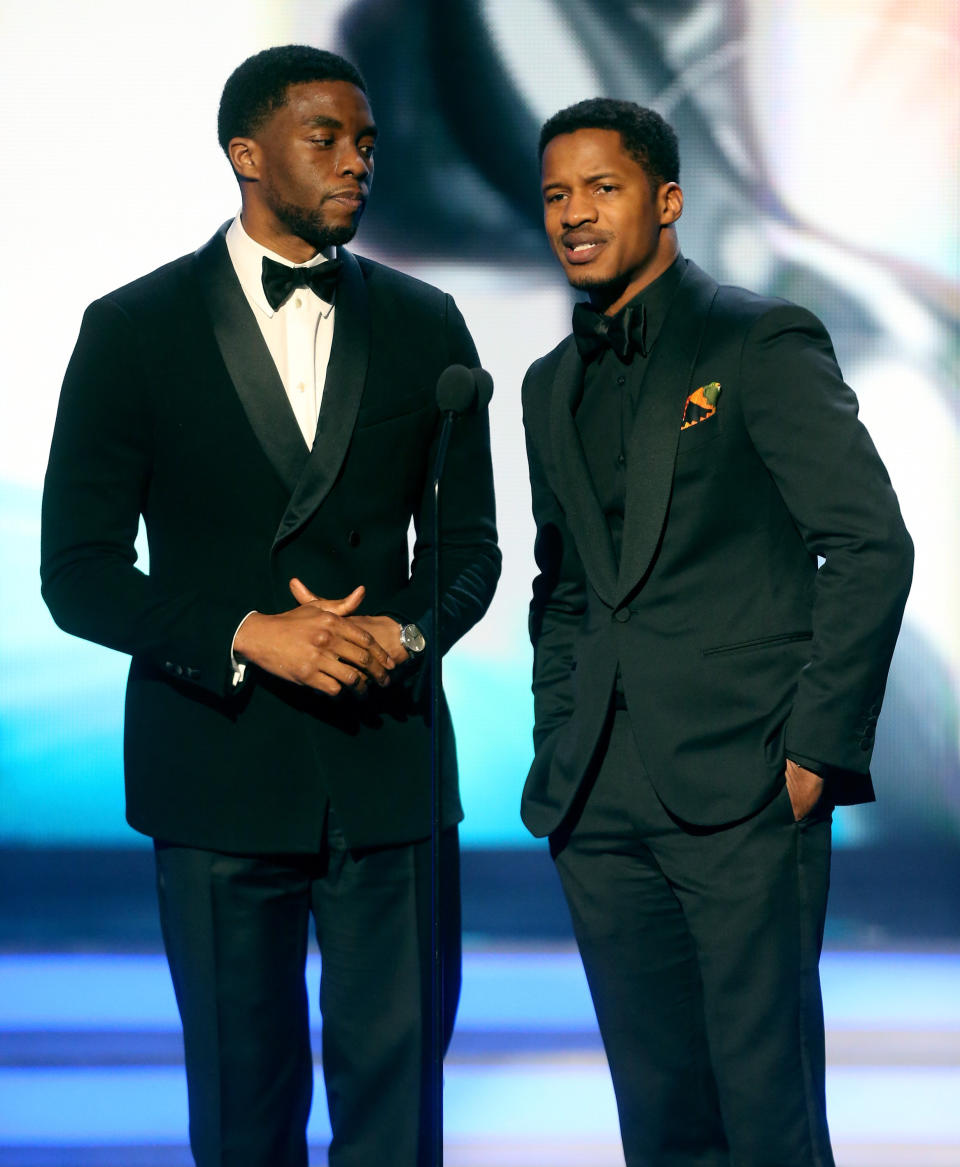 Actors Chadwick Boseman (L) and Nate Parker speak onstage during the 47th NAACP Image Awards.