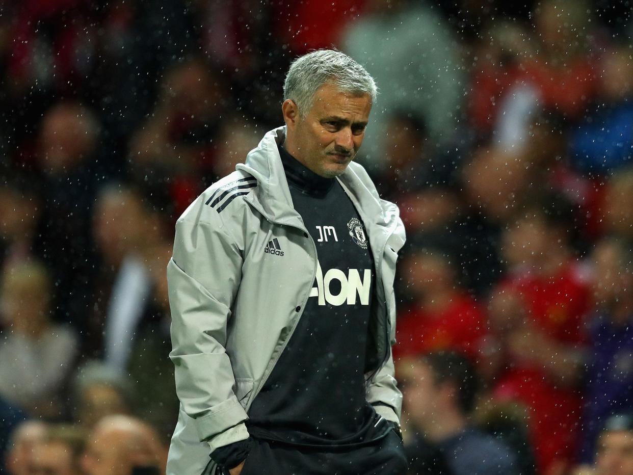 Jose Mourinho watched as his men secured an easy win against Burton: Getty