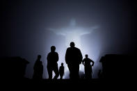 <p>President Barack Obama, First Lady Michelle Obama, and daughters Sasha and Malia, tour the Christ the Redeemer statue March 19, 2011 in Rio de Janeiro, Brazil. President Obama visited various landmarks and locations during the five-day Latin American trip. (Photo by Pete Souza/The White House via Getty Images) </p>