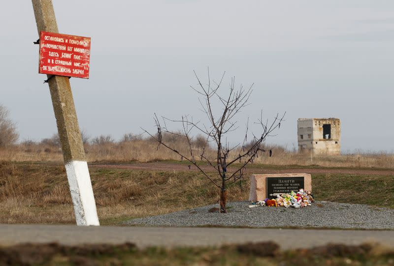 FILE PHOTO: A view shows a monument at the crash site of Malaysia Airlines Flight MH17 plane near Hrabove