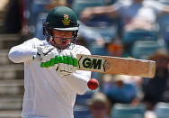 Cricket - Australia v South Africa - First Test cricket match - WACA Ground, Perth, Australia - 6/11/16. South Africa's Quinton de Kock hits a shot at the WACA Ground in Perth. REUTERS/David Gray