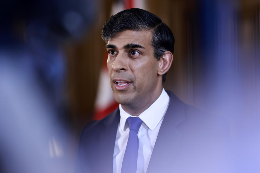 Britain's Prime Minister Rishi Sunak records a statement on the Iranian attacks on Israel overnight, inside 10 Downing Street, London, Sunday, April 14, 2024. Israel praised the success of its defenses in the face of an unprecedented attack by Iran involving hundreds of drones, ballistic missiles and cruise missiles. (Benjamin Cremel/Pool via AP)